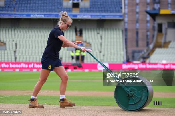 Meg Lay, lead of the all-female ground staff rolls the pitch ahead of play during the Women's Ashes 1st Vitality IT20 match between England and...