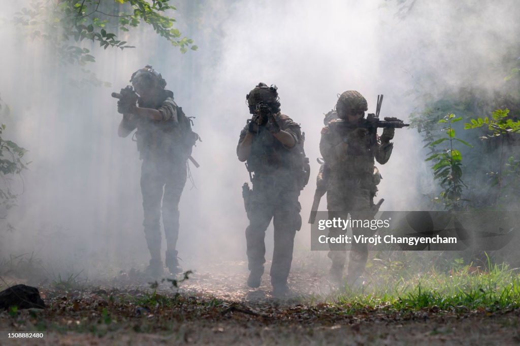 Silhouette of a soldier patrolling