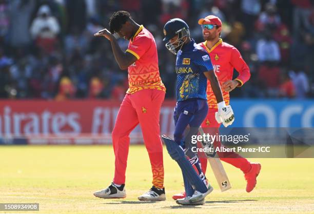 Richard Ngarava of Zimbabwe celebrates after dismissing Dimuth Karunaratne of Sri Lanka during the ICC Men's Cricket World Cup Qualifier Zimbabwe...