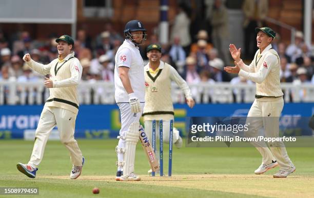 Jonny Bairstow of England reacts after being stumped by Alex Carey and Steve Smith, David Warner and Marnus Labuschagne celebrate during the fifth...