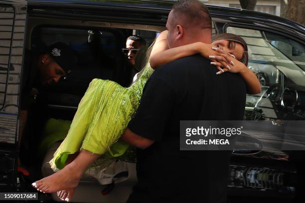 Cardi B is seen being carried in to her hotel by one of her team on July 6, 2023 in Paris, France.