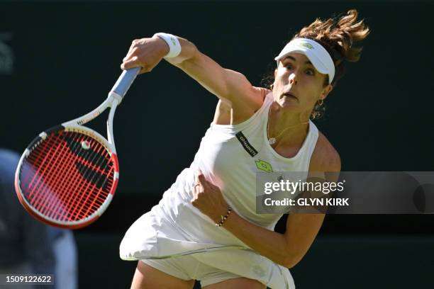 France's Alize Cornet returns the ball to Kazakhstan's Elena Rybakina during their women's singles tennis match on the fourth day of the 2023...