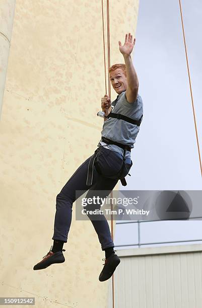 Greg Rutherford attends the launch of Walkers Deep Ridged crisp at The Old Truman Brewery on August 29, 2012 in London, England.