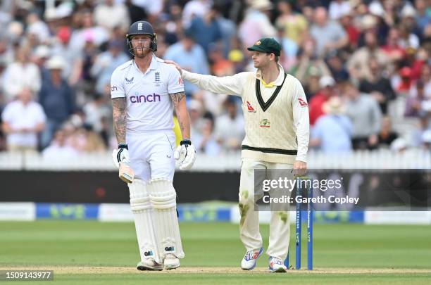 Ben Stokes is consoled by Steven Smith of Australia after losing his wicket during Day Five of the LV= Insurance Ashes 2nd Test match between England...