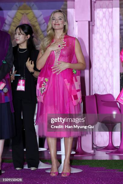 Actress Margot Robbie poses for media wearing a South Korean Traditional 'HanBok' costume the Seoul Premiere of "Barbie" on July 02, 2023 in Seoul,...