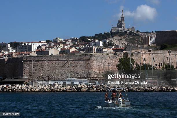 View from the Vieux-Port towards the church of Notre Dame de la Garde on August 15, 2012 in Marseille, France. Marseille, the second largest city in...