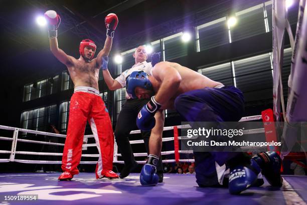 Robert Krason of Poland celebrates against Mohammed Hamdi Hajji of Spain during the Kickboxing - Men's Full Contact - 86kg Final Bout on Day Thirteen...