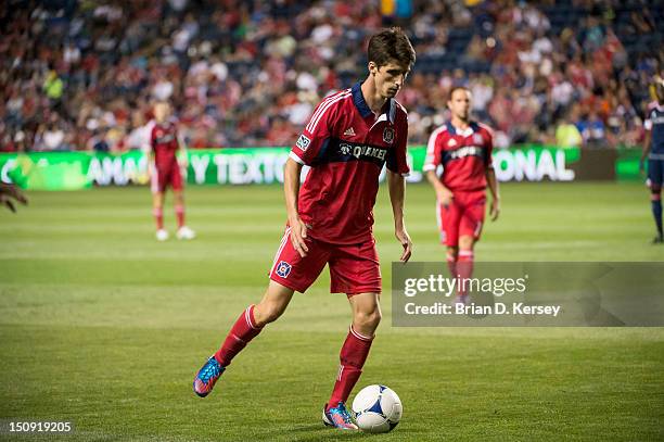 Alvaro Fernandez of Chicago Fire moves the ball against the New England Revolution at Toyota Park on August 18, 2012 in Bridgeview, Illinois. The...