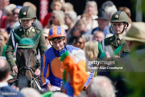 Ryan Moore returns after riding Auguste Rodin to win The Dubai Duty Free Irish Derby at Curragh Racecourse on July 02, 2023 in Kildare, Ireland.