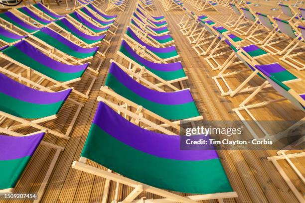 Wimbledon deck chairs lined up in preparation for the Wimbledon Lawn Tennis Championships at the All England Lawn Tennis and Croquet Club at...