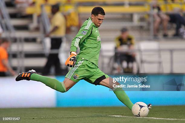 Goalkeeper Andy Gruenebaum of the Columbus Crew controls the ball against the New England Revolution on August 25, 2012 at Crew Stadium in Columbus,...