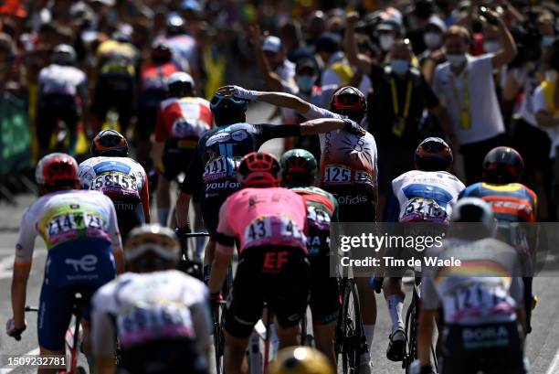 Romain Bardet of France and Team DSM-Firmenich and stage winner Victor Lafay of France and Team Cofidis react after the stage two of the 110th Tour...