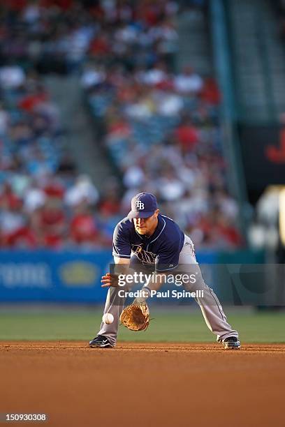 Brooks Conrad of the Tampa Bay Rays fields a ground ball during the game against the Los Angeles Angels of Anaheim on July 28, 2012 at Angel Stadium...