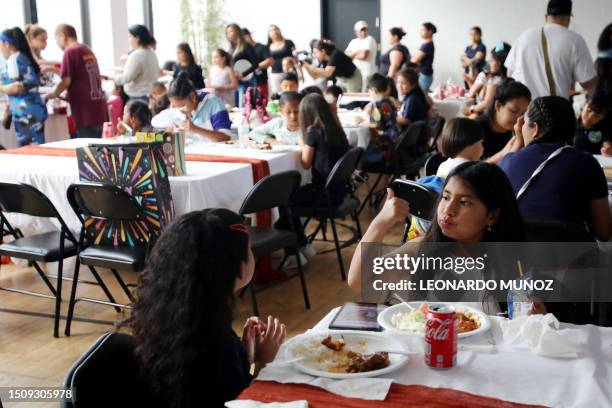 Valentina Caisatitin attends a dinner for asylum seeker families at Romemu Center in New York City on June 27, 2023. The unprecedented arrival of...