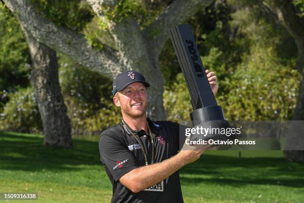 Talor Gooch of RangeGoats GC poses with the trophy after winning the LIV Golf - Andalucia at Real Club Valderrama on July 2, 2023 in Cadiz, Spain.