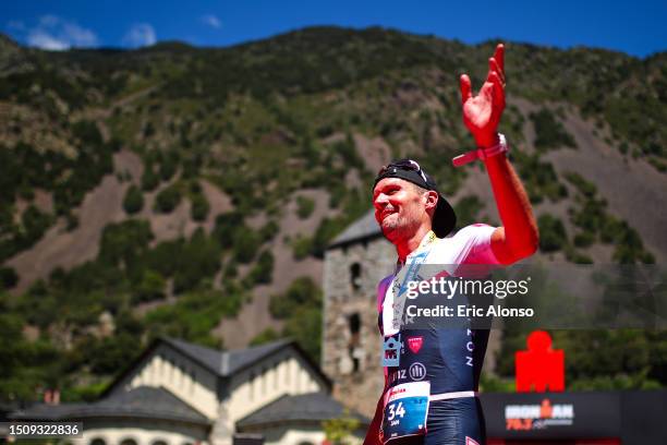 Jan Frodeno of Germany celebrates winning the men's IRONMAN 70.3 Andorra on July 02, 2023 in Andorra la Vella, Andorra.