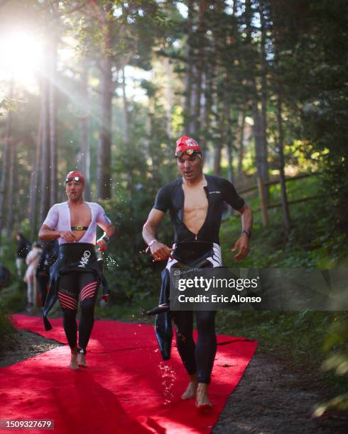 Athletes runs in the first transition of IRONMAN 70.3 Andorra on July 02, 2023 in Andorra la Vella, Andorra.