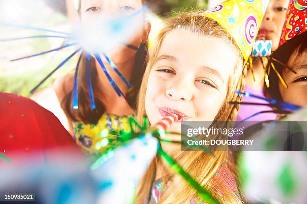 birthday party - party horn blower stock pictures, royalty-free photos & images