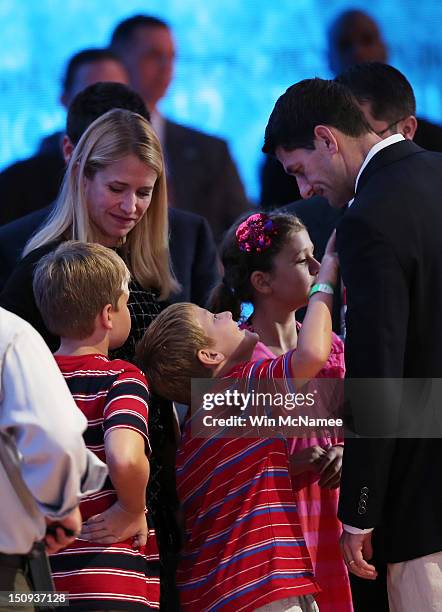 Republican vice presidential candidate, U.S. Rep. Paul Ryan stands with his sons Charlie Ryan , and Sam Ryan, and wife, Janna Ryan and daughter Liza...