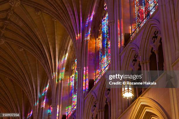 cathedral stained glass light - national cathedral stock pictures, royalty-free photos & images