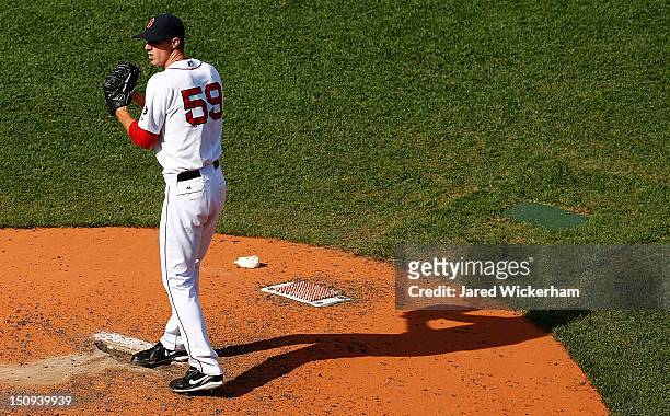 Clayton Mortensen of the Boston Red Sox pitches against the Kansas City Royals during the game on August 27, 2012 at Fenway Park in Boston,...
