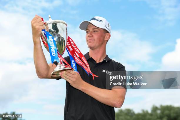 Daniel Hillier of New Zealand poses for a photo with the Betfred British Masters trophy after winning the Betfred British Masters hosted by Sir Nick...