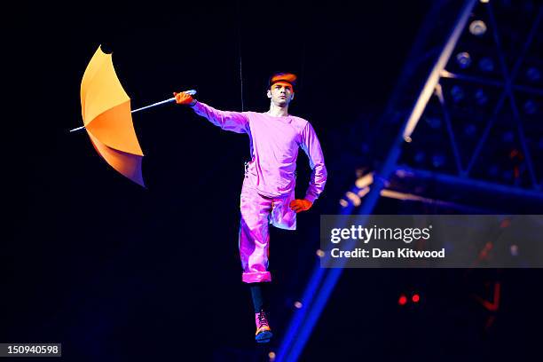 Artists perform with umbrellas during the Opening Ceremony of the London 2012 Paralympics at the Olympic Stadium on August 29, 2012 in London,...