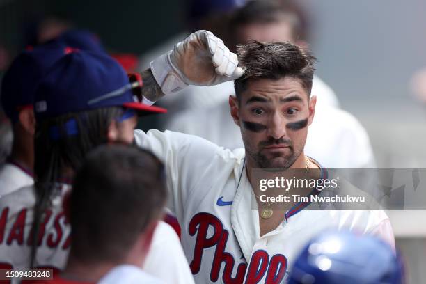 Nick Castellanos of the Philadelphia Phillies reacts with teammates after hitting a solo home run during the first inning against the Washington...