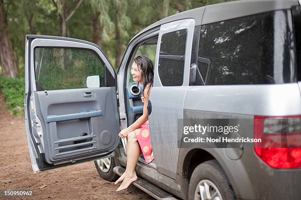 a woman in an suv at the ocean - bildörr bildbanksfoton och bilder