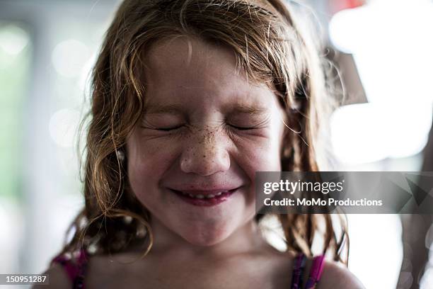 girl (5 yrs) smiling and squinting-portrait - squinting stock pictures, royalty-free photos & images