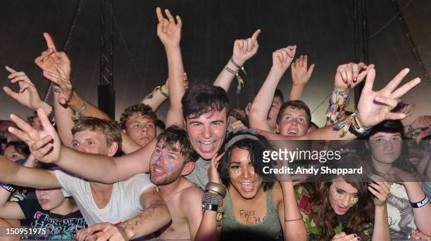 Crowd of festival music fans enjoy the performances and atmosphere during Reading Festival 2012 at Richfield Avenue on August 25, 2012 in Reading,...