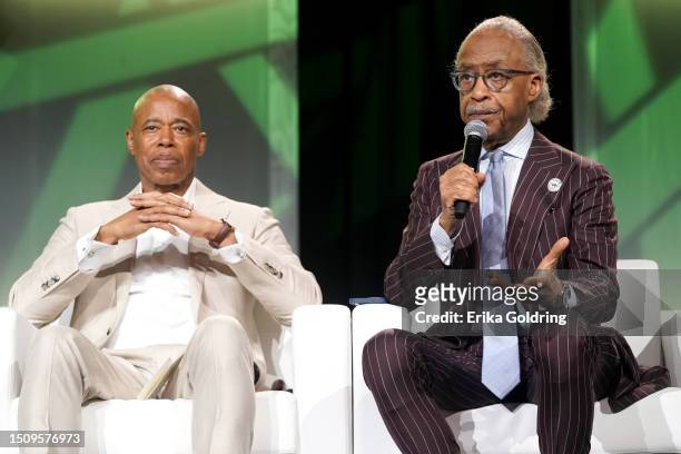 New York City Mayor Eric Adams and Al Sharpton speak onstage during the 2023 ESSENCE Festival Of Culture™ at Ernest N. Morial Convention Center on...