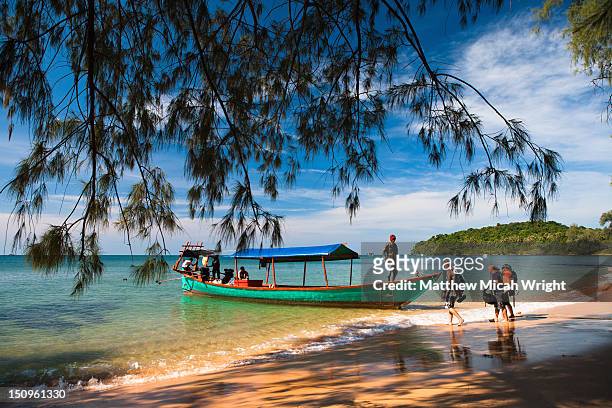 a taxi boat that returns visitors to the mainland. - sihanoukville stock pictures, royalty-free photos & images