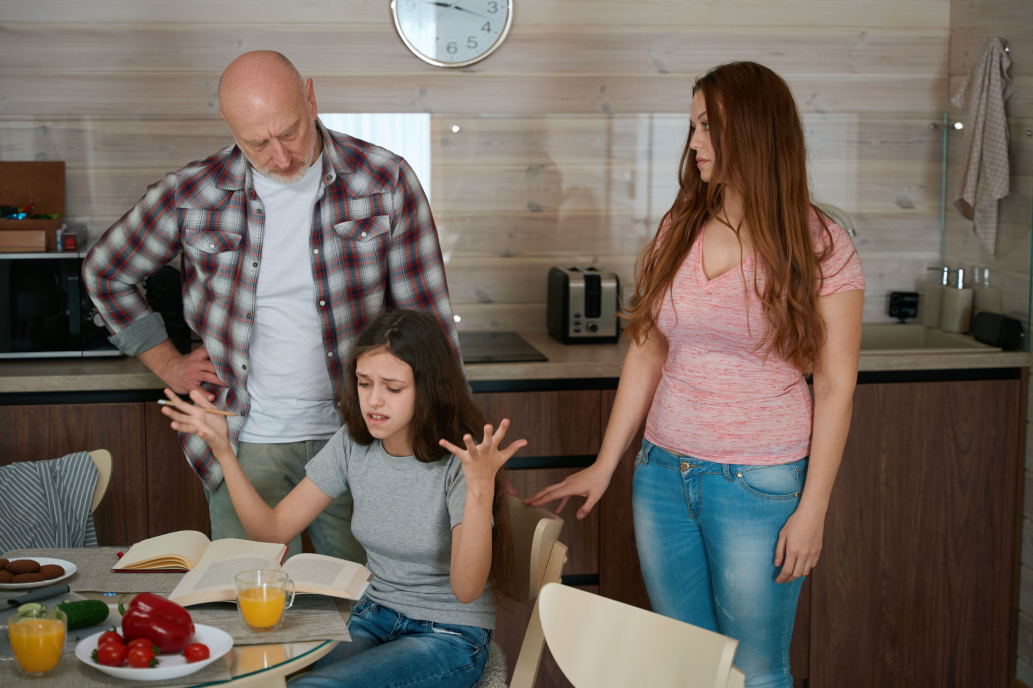 Adolescent girl feeling desperate about difficult homework Adolescent girl feeling desperate about difficult homework