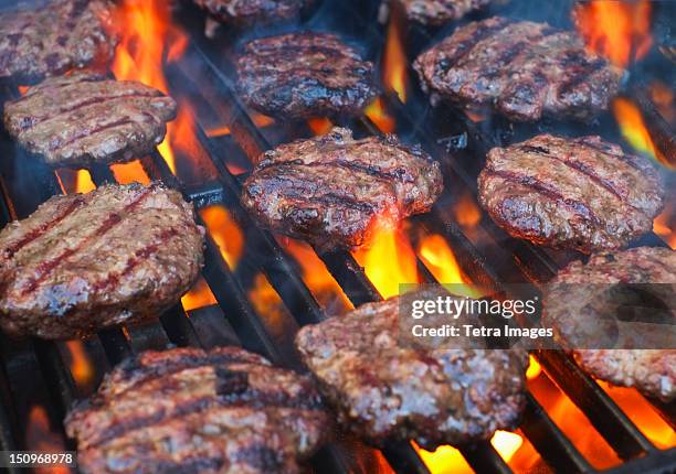 usa, new york city, hamburgers on bbq - grilled burgers stock pictures, royalty-free photos & images