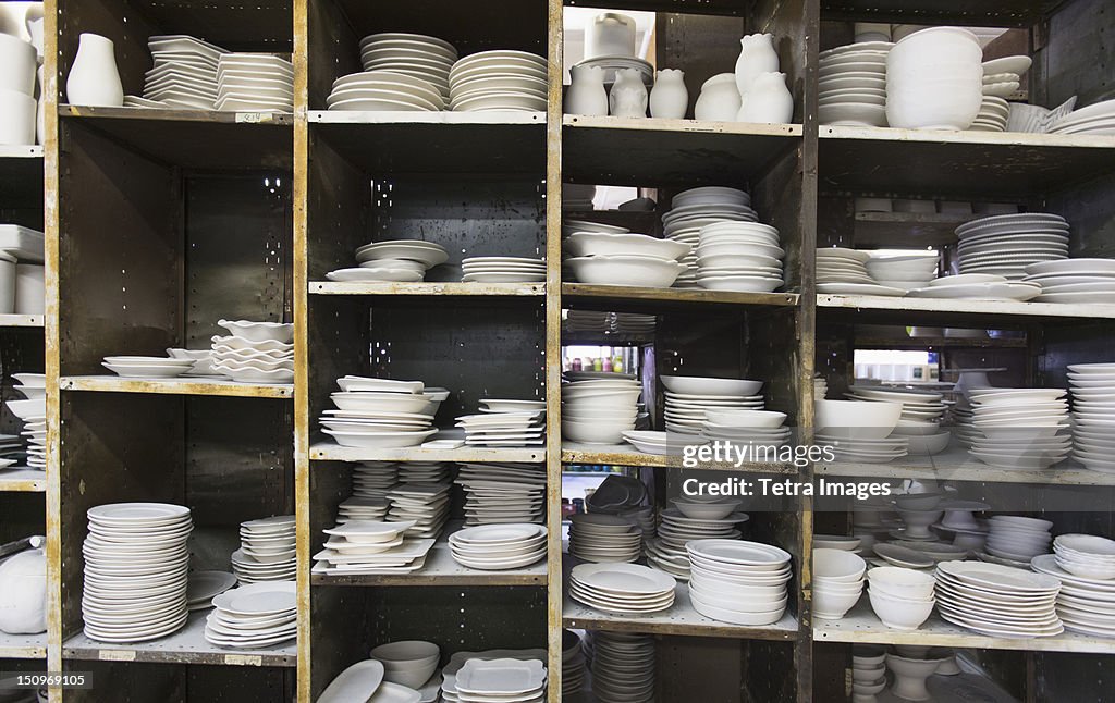 USA, New Jersey, Jersey City, Pottery on shelves