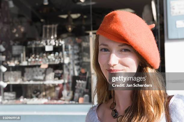 france, pas-de-calais, escalles, portrait of young woman in red beret - beret stock pictures, royalty-free photos & images