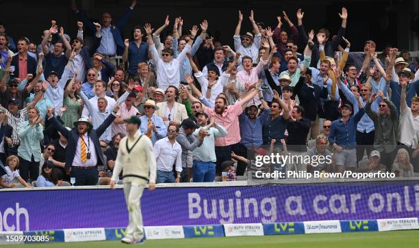 Spectators cheer a Ben Stokes six during the fifth day of the 2nd Test between England and Australia at Lord's Cricket Ground on July 02, 2023 in...