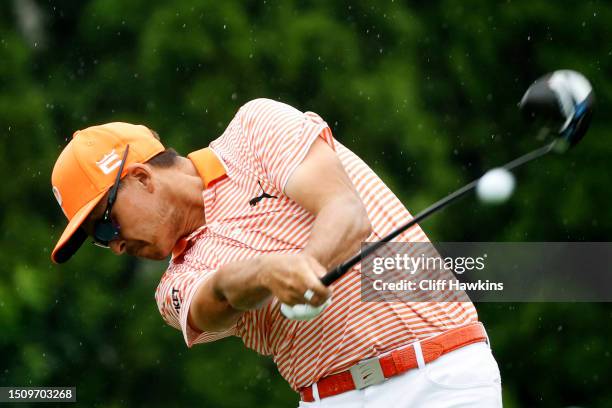 Rickie Fowler of the United States plays his shot from the seventh tee during the final round of the Rocket Mortgage Classic at Detroit Golf Club on...