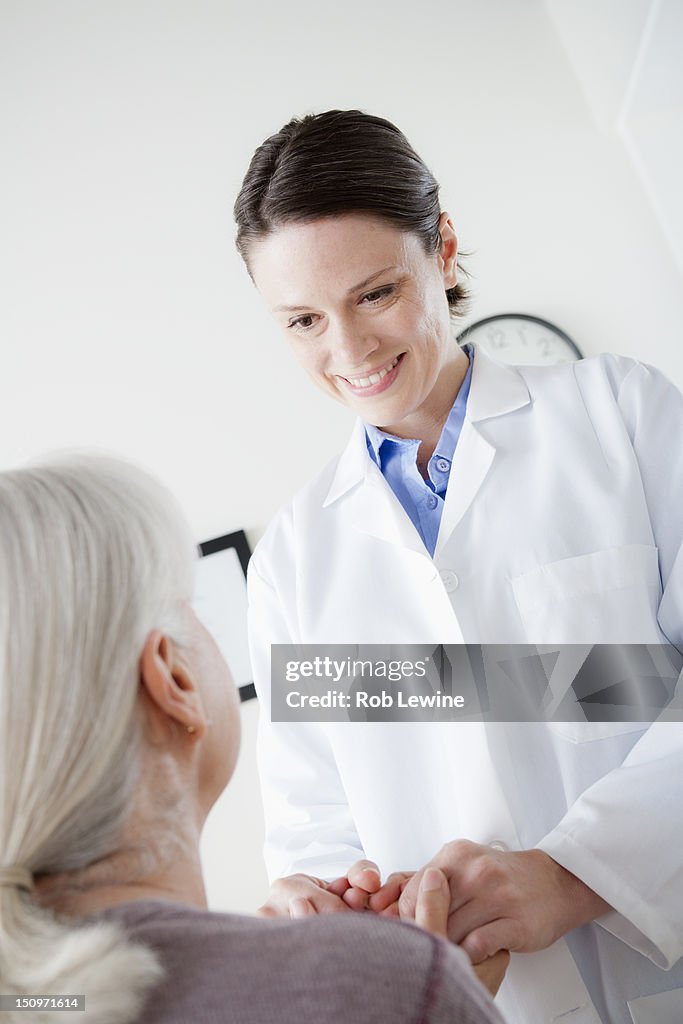 USA, California, Los Angeles, Doctor talking with senior patient