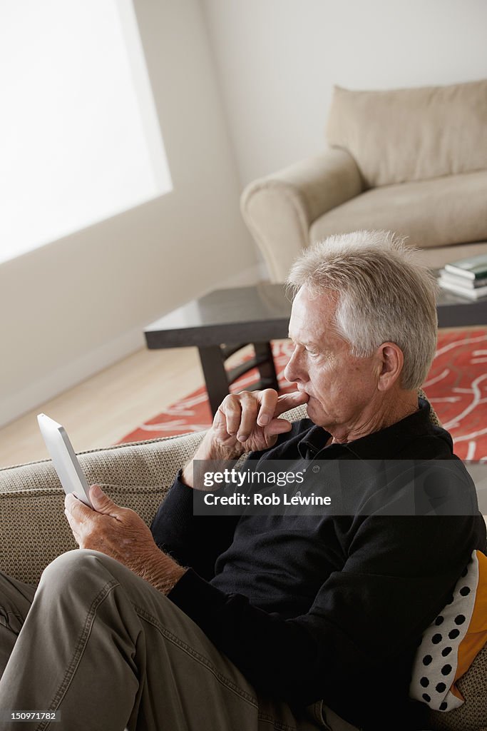 USA, California, Los Angeles, Senior man using digital tablet