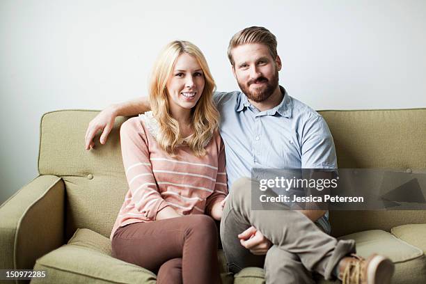 usa, utah, salt lake city, portrait of young couple - couple couch imagens e fotografias de stock