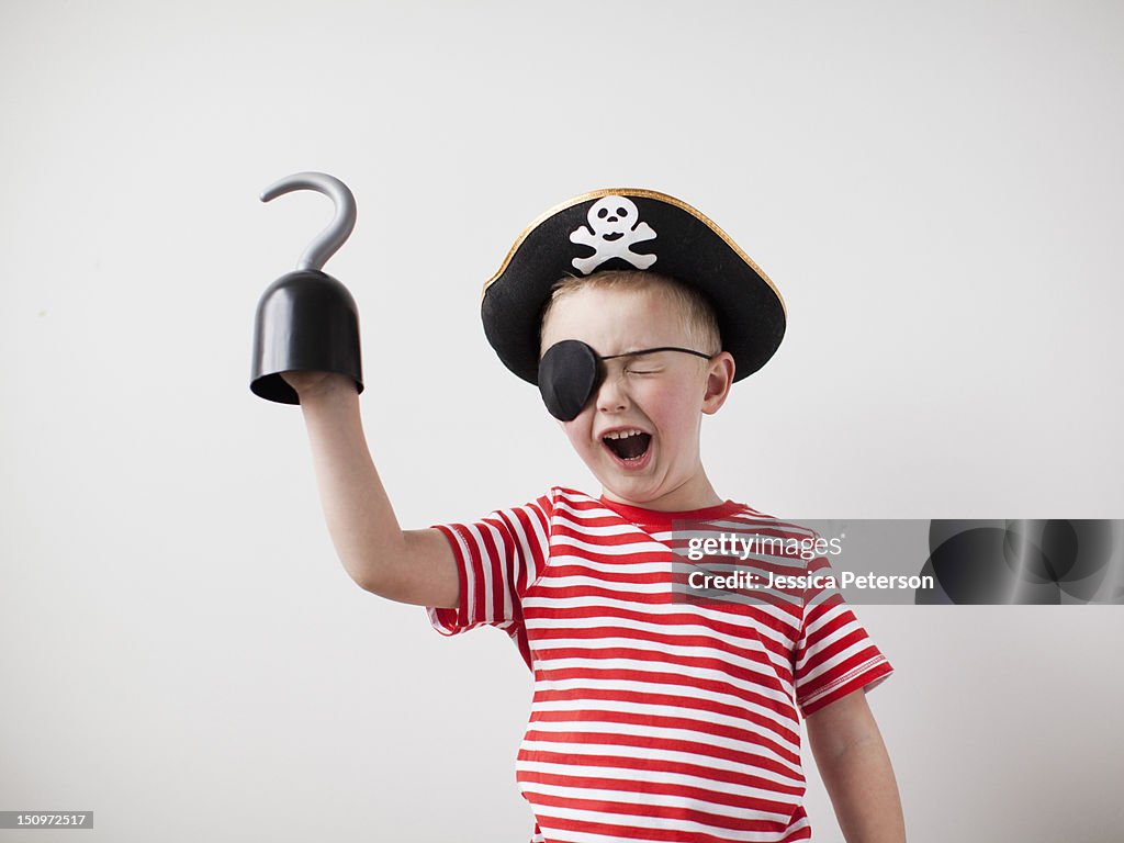 Toddler boy (2-3) dressed-up as pirate