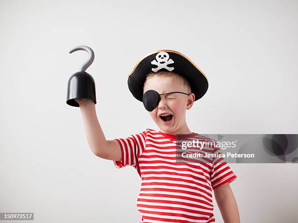 toddler boy (2-3) dressed-up as pirate - pirate t shirt stock pictures, royalty-free photos & images