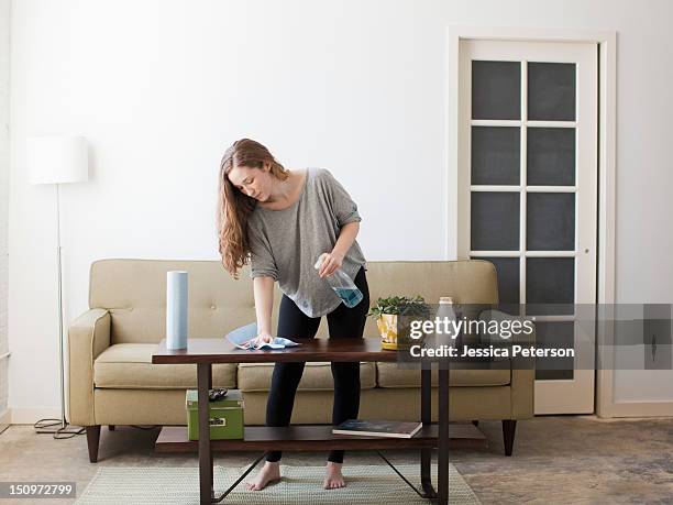 usa, utah, salt lake city, young woman cleaning - frau putzen stock-fotos und bilder