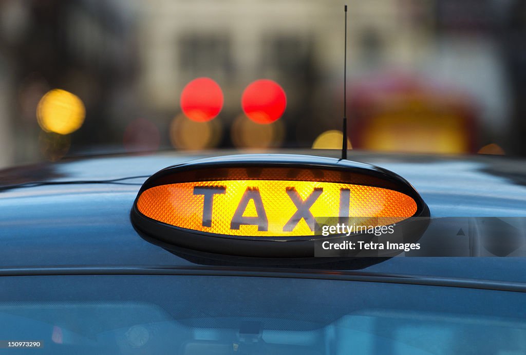UK, England, London, Sign on taxi cab