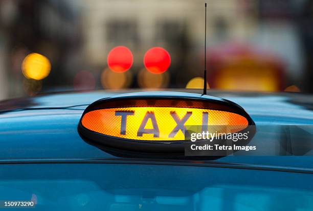 uk, england, london, sign on taxi cab - taxi stock pictures, royalty-free photos & images