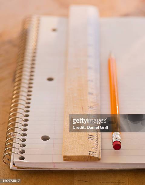 close up of notebook, ruler and pencil, studio shot - tidy desk stock pictures, royalty-free photos & images