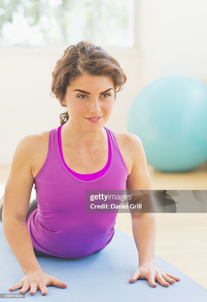 USA, New Jersey, Jersey City, Woman practicing yoga