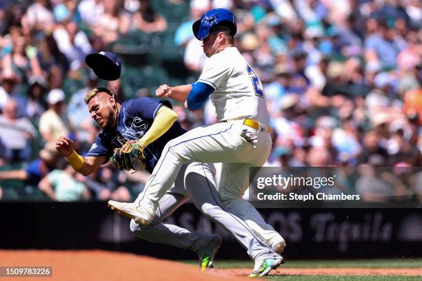Isaac Paredes of the Tampa Bay Rays and Ty France of the Seattle Mariners collide during the third inning at T-Mobile Park on July 02, 2023 in...